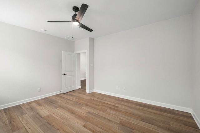 unfurnished room with light hardwood / wood-style floors and ceiling fan