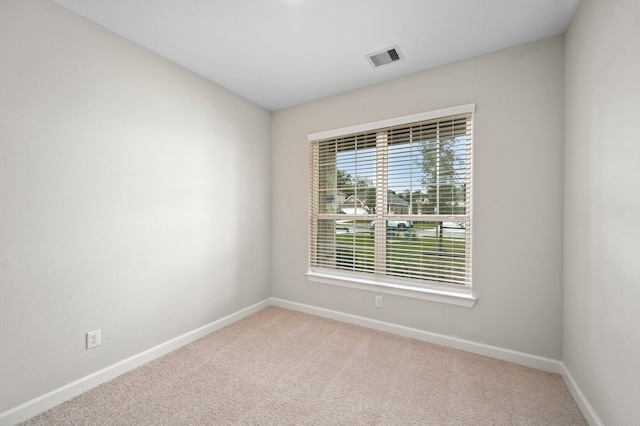 view of carpeted spare room