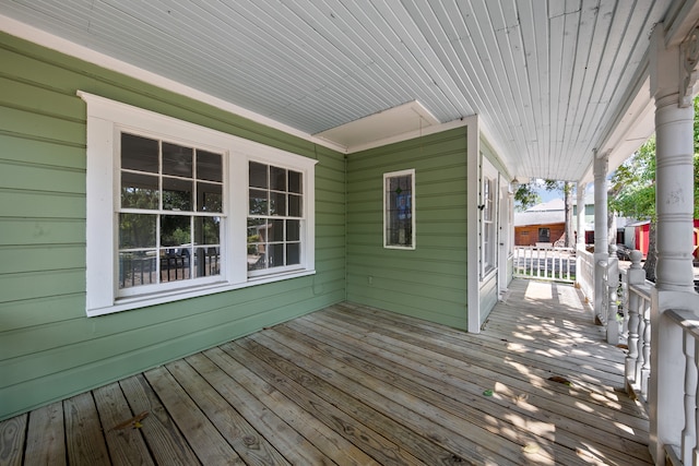 wooden terrace featuring a porch