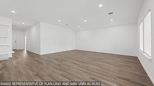 unfurnished room featuring hardwood / wood-style flooring