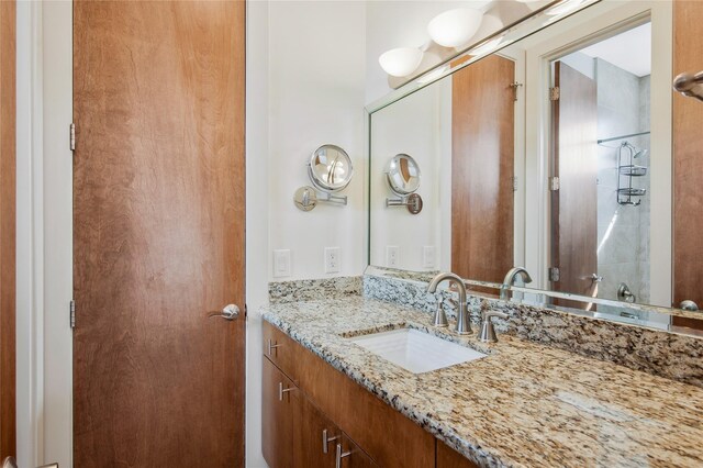 bathroom featuring vanity and walk in shower