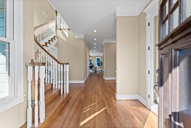 501 Cordell St, Houston, TX 77009 - entrance foyer featuring crown molding, wood finished floors, baseboards, and stairs