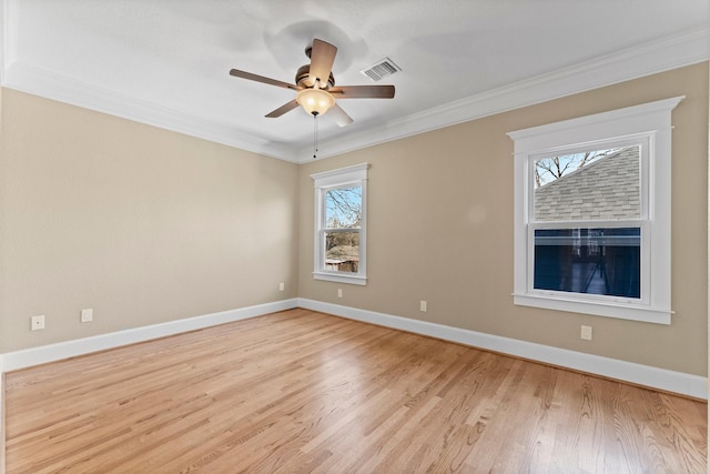 501 Cordell St, Houston, TX 77009 - empty room with light wood-style floors, a ceiling fan, crown molding, and baseboards