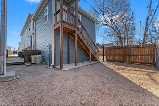501 Cordell St, Houston, TX 77009 - back of house featuring stairs, fence, a deck, central AC, and a gate