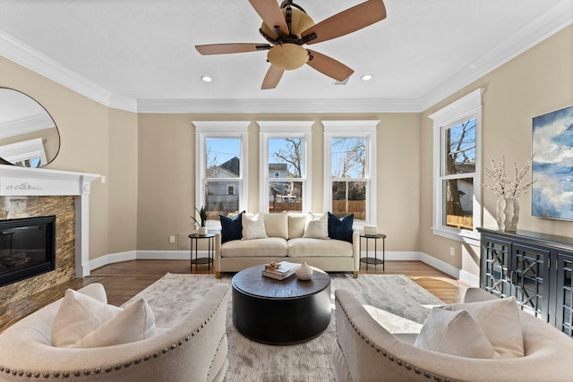 501 Cordell St, Houston, TX 77009 - living room with a premium fireplace, ornamental molding, baseboards, and wood finished floors