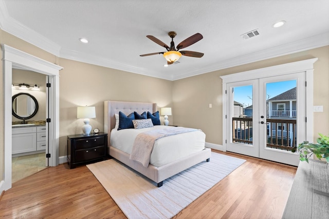 501 Cordell St, Houston, TX 77009 - bedroom featuring french doors, light wood-style floors, access to exterior, baseboards, and ornamental molding