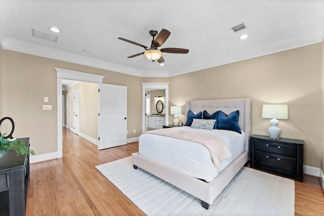 501 Cordell St, Houston, TX 77009 - bedroom with light wood-style floors, ornamental molding, baseboards, ceiling fan, and connected bathroom