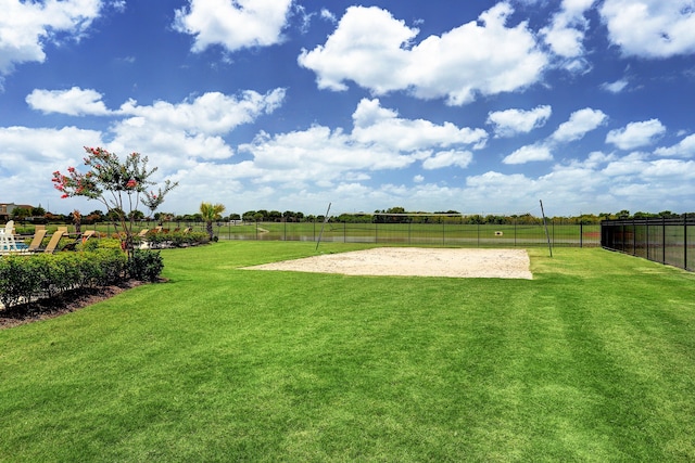 view of yard featuring a rural view and volleyball court