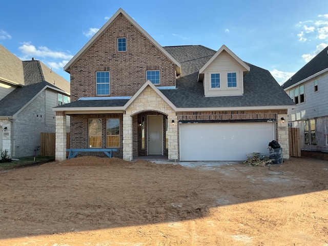 view of front of home with a garage