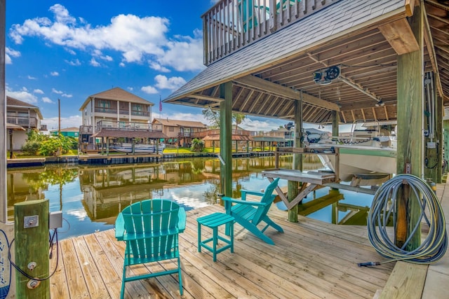 dock area with a water view