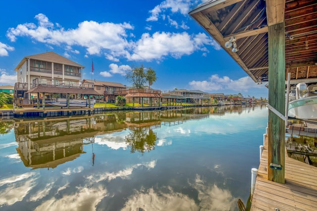 dock area with a water view