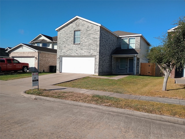 front facade with a front yard and a garage