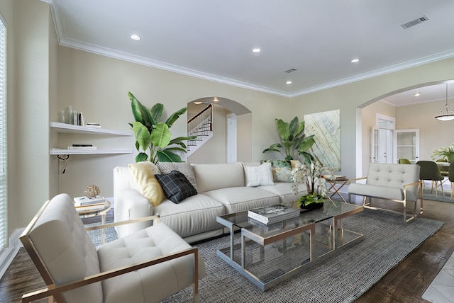 living room featuring ornamental molding and hardwood / wood-style floors