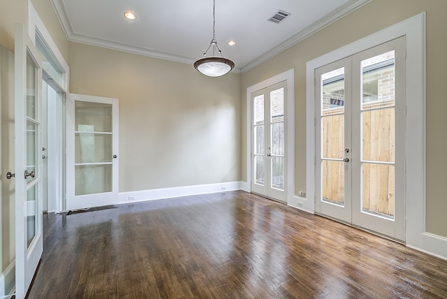 unfurnished room with french doors, dark wood-type flooring, and a wealth of natural light