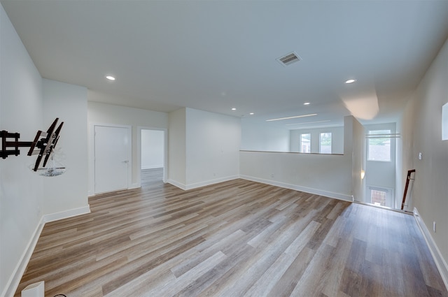 spare room with light hardwood / wood-style flooring