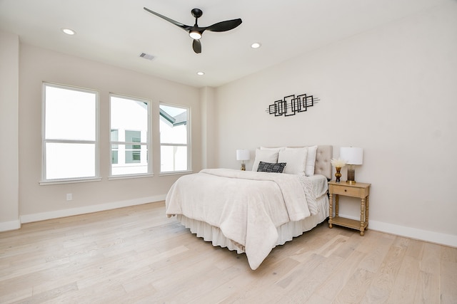 bedroom featuring ceiling fan and light wood-type flooring