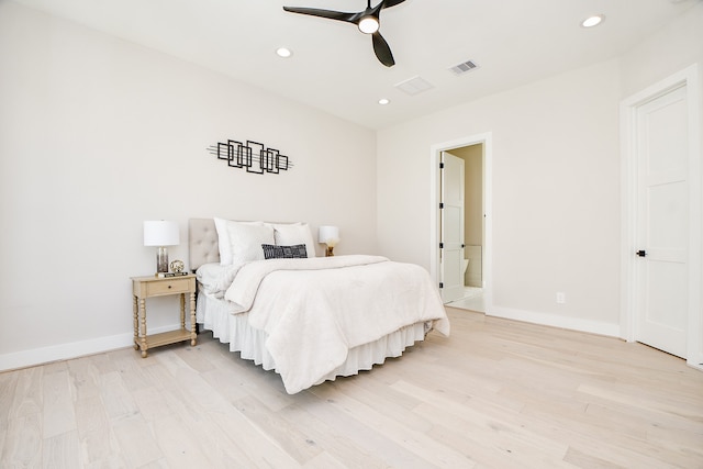 bedroom with light hardwood / wood-style floors and ceiling fan