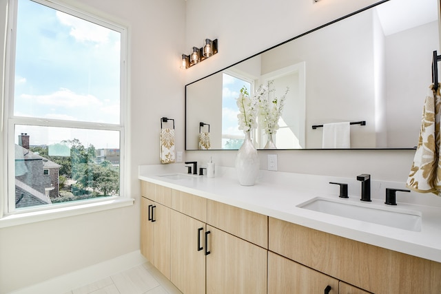 bathroom with vanity and tile patterned floors