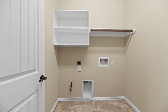 clothes washing area featuring gas dryer hookup, washer hookup, and electric dryer hookup