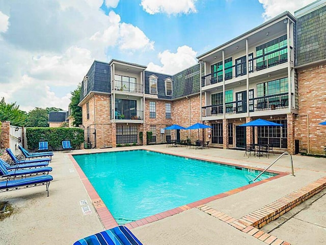 view of pool with a patio area