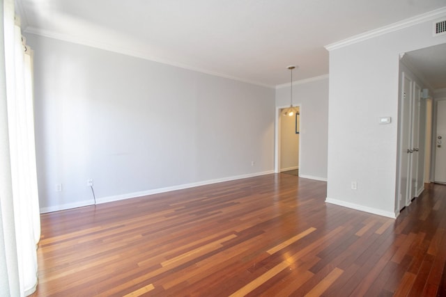 2400 N Braeswood Blvd Unit 314, Houston, TX 77030 - empty room with dark wood-style floors, baseboards, and ornamental molding