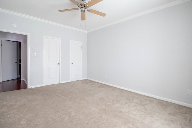 2400 N Braeswood Blvd Unit 314, Houston, TX 77030 - unfurnished bedroom with carpet flooring, ornamental molding, baseboards, and a ceiling fan