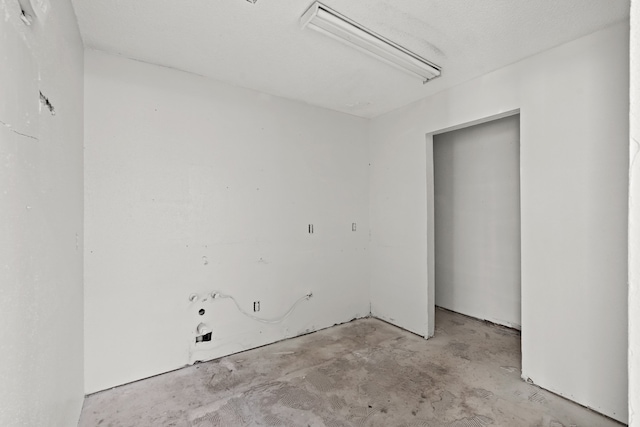 interior space featuring a textured ceiling