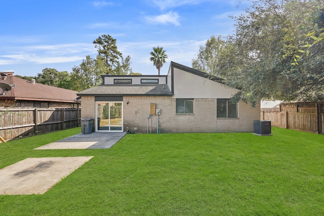 back of house with a patio, cooling unit, and a lawn