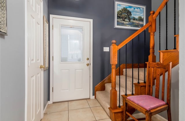 view of tiled foyer entrance