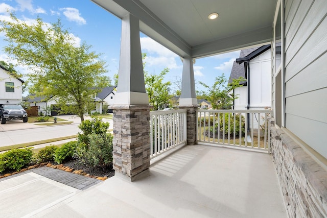 view of patio featuring a porch