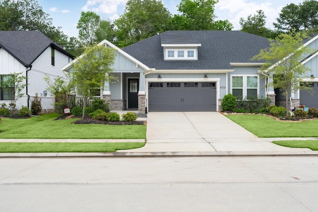 craftsman-style house with covered porch and a front yard