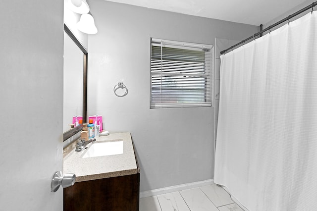 bathroom with vanity and a shower with curtain