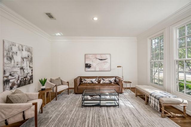 living room featuring ornamental molding and hardwood / wood-style flooring