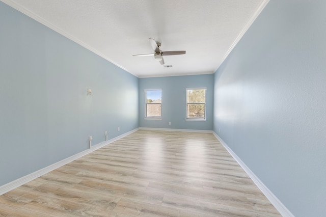 unfurnished room with light hardwood / wood-style flooring, ceiling fan, and crown molding