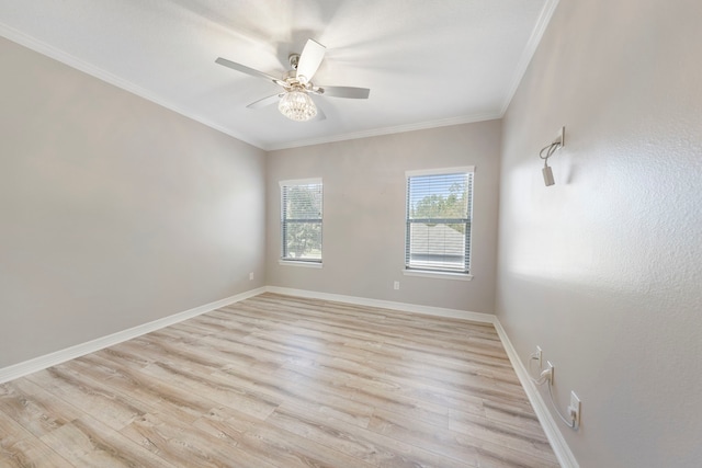 spare room with light hardwood / wood-style flooring, ceiling fan, and ornamental molding