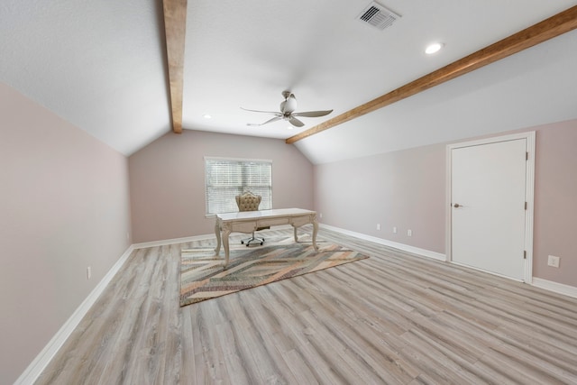 unfurnished office featuring light wood-type flooring, lofted ceiling with beams, and ceiling fan