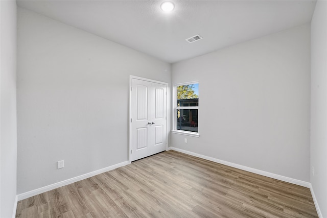 empty room featuring light hardwood / wood-style flooring