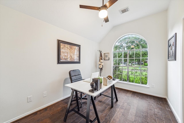 office space featuring dark hardwood / wood-style flooring, ceiling fan, and vaulted ceiling