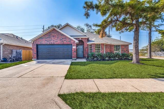 ranch-style home with a front yard and a garage