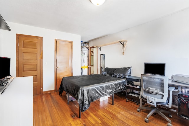 bedroom featuring hardwood / wood-style floors