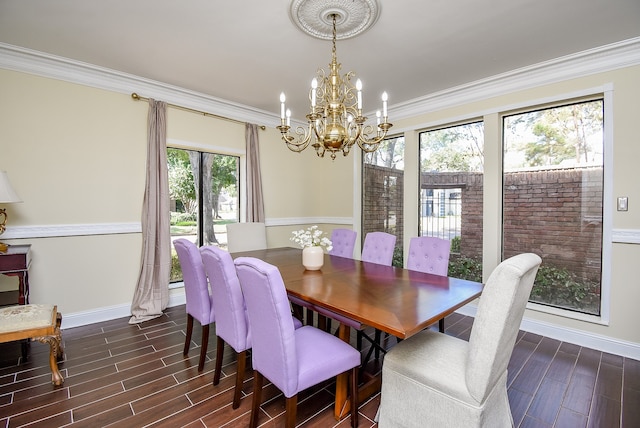 dining room featuring dark wood-type flooring, crown molding, and plenty of natural light