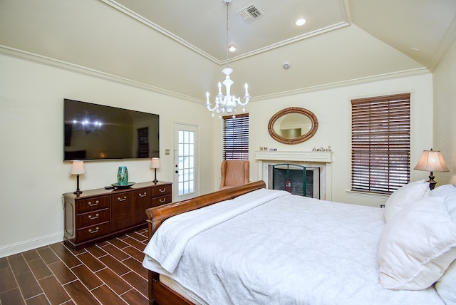 bedroom with crown molding, a chandelier, lofted ceiling, and dark hardwood / wood-style flooring