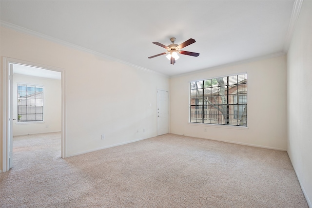 2255 Braeswood Park Dr Unit 184, Houston, TX 77030 - carpeted empty room featuring a wealth of natural light, ceiling fan, and crown molding
