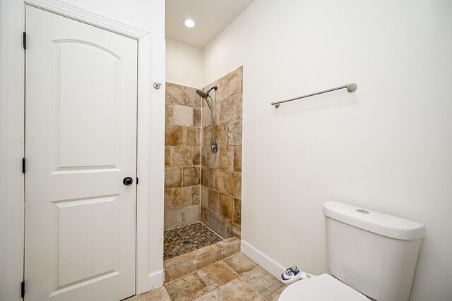 30626 Logger Ln, Magnolia, TX 77355 - full bath with a tile shower, toilet, and baseboards
