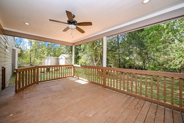30626 Logger Ln, Magnolia, TX 77355 - wooden terrace featuring a ceiling fan and view of scattered trees