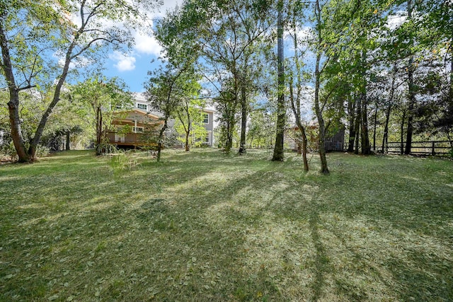 view of yard featuring a wooden deck