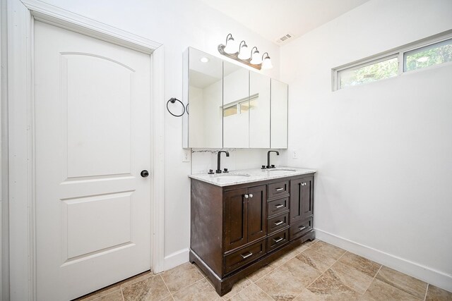 30626 Logger Ln, Magnolia, TX 77355 - bathroom with baseboards and double vanity