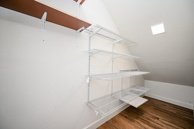 30626 Logger Ln, Magnolia, TX 77355 - spacious closet featuring lofted ceiling and wood finished floors