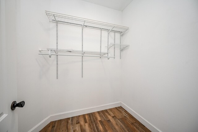 30626 Logger Ln, Magnolia, TX 77355 - spacious closet featuring dark wood finished floors
