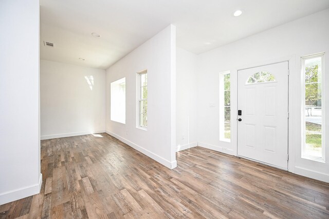30626 Logger Ln, Magnolia, TX 77355 - foyer featuring wood finished floors, baseboards, and recessed lighting
